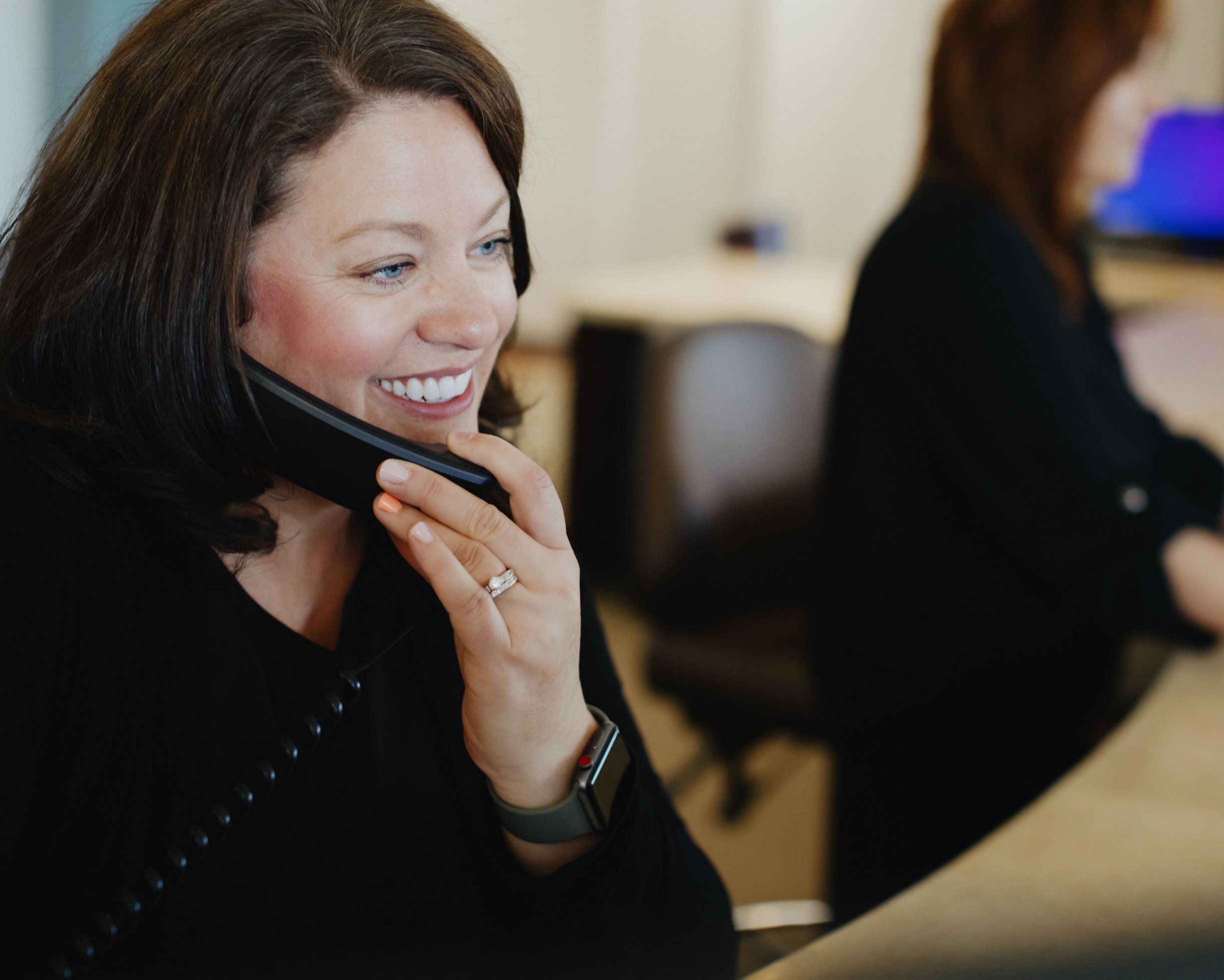 Receptionist on phone
