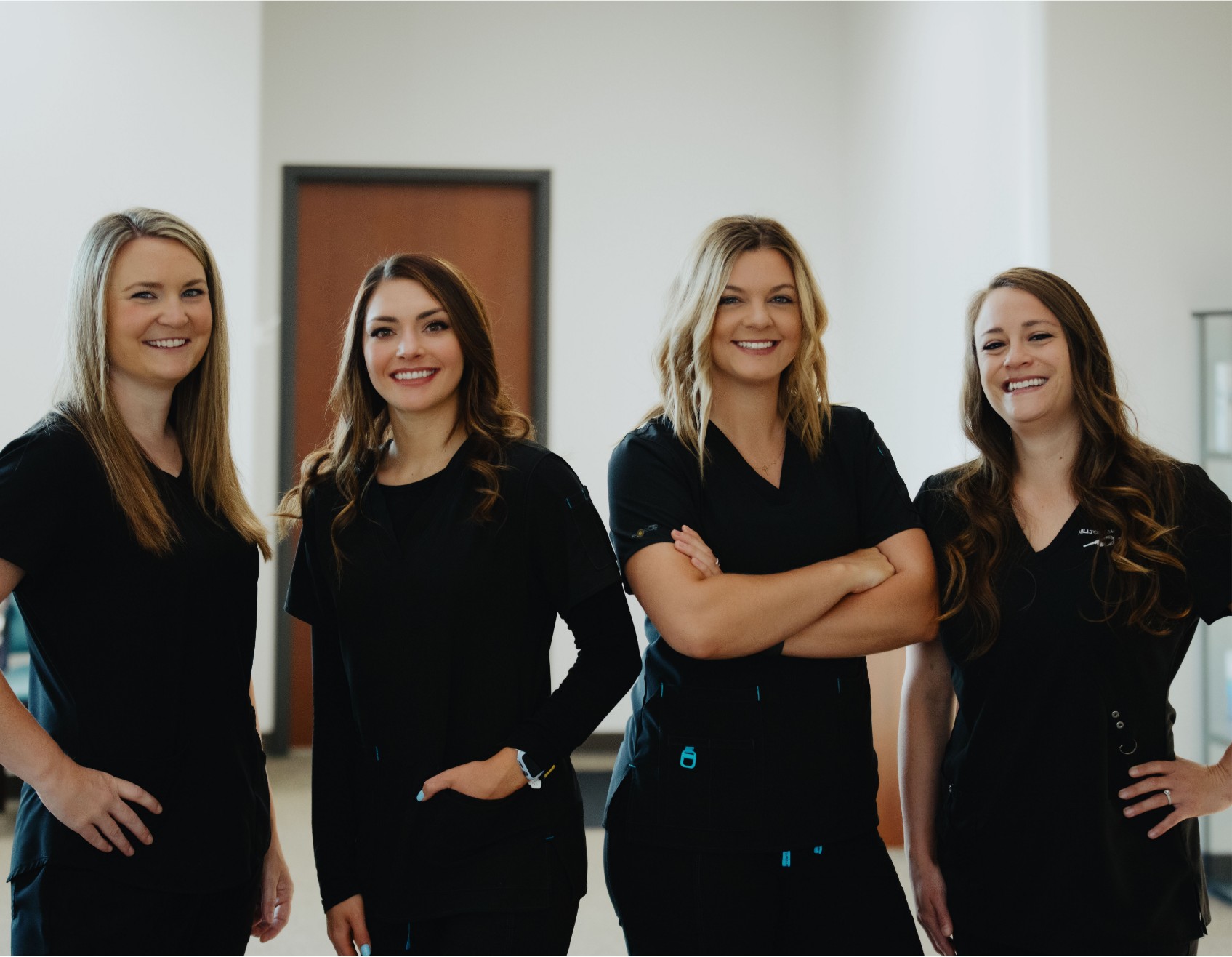 a group of women smiling